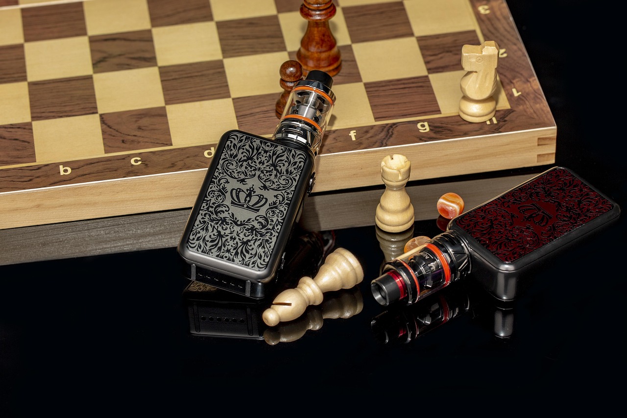 Assorted vape accessories including drip tips, cables and cases